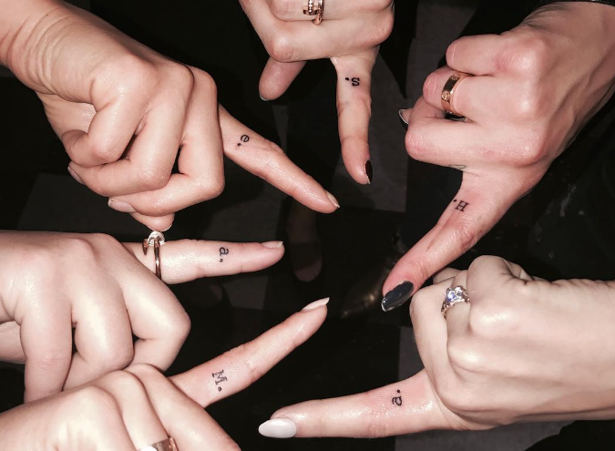 Best friends matching tattoo on finger